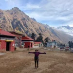 during the Eerest three high pass trekking Miss Anne from Vietnam enjoying the magical view of mt. everest and exploring the Tengboche Monastery along the way to Everest three high passes trekking in last year with our guide