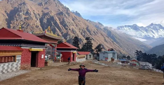 during the Eerest three high pass trekking Miss Anne from Vietnam enjoying the magical view of mt. everest and exploring the Tengboche Monastery along the way to Everest three high passes trekking in last year with our guide