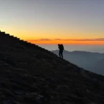 early in the morning walking edge of pikey peak viewpoint