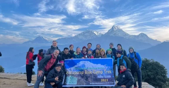 trekking group from germany on the top of the poonhill viewpoint alt.3210m from sea level